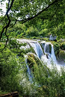 Waterfall Prints: Strbacki buk waterfall flows through green landscape in Bosnia and Herzegovina during sunny weather