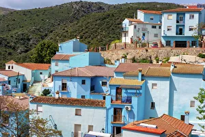 House Exterior Prints: Street in blue painted Smurf house village of Juzcar