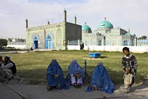 Afgani Prints: Street boy who sells necklaces for living and ladies in burquas, Shrine of Hazrat Ali