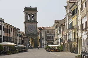 Towers Prints: Street cafes and the Town Gate with ornamental clock tower, Este, Veneto, Italy, Europe