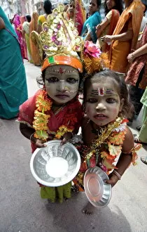 Images Dated 17th October 2009: Two street children dressed in the style of Krishna at Diwali festival time
