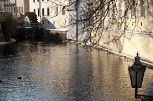Images Dated 21st December 2009: Street lamp with icicles and mill wheel at Certovka Canal, Mala Strana
