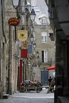 Street of lantern lights and traditional signs, Dinan, Cotes d Armor
