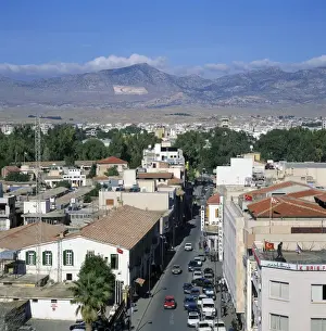 Street and rooftops of Turkish Cypriot North Nicosia with Kyrenia mountains in distance