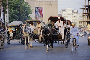 Pulling Prints: Street scene with horse drawn carriages