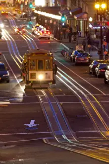 San Francisco Prints: Street scene at night with historic San Francisco street car