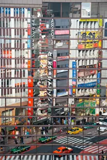 Shibuya Prints: Street scene reflections at a busy Shibuya intersection, Tokyo, Honshu, Japan, Asia