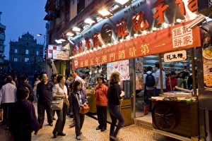Buying Prints: Street scene and St. Pauls cathedral in distance, Macau, China, Asia