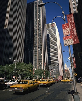 Cabs Prints: Street scene with yellow cabs