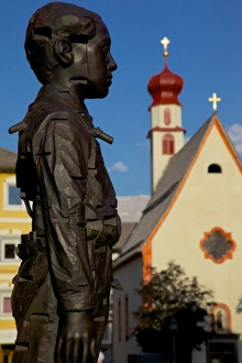 Street sculpture and Little Church, Ortisei, Gardena Valley, Bolzano Province, Trentino-Alto Adige / South Tyrol, Italian Dolomites, Italy, Europe