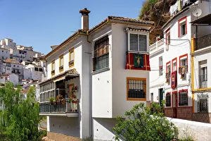 House Exterior Prints: Street with white houses in Setenil de las Bodegas