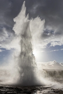 Geyser Prints: Strokkur Geysir erupting against stormy sky, Geysir, South West Iceland, Polar Regions