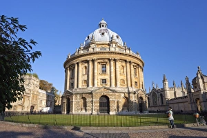 Images Dated 8th October 2009: Student with bicycle in front of Radcliffe Camera and All Souls College