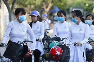 Indigenous Culture Prints: Students dressed in Ao Dai on the way to school, Cai Be, Vietnam, Indochina