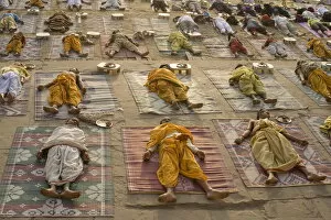 Images Dated 26th February 2009: Students of a Sanskrit school performing the savasana (corpse