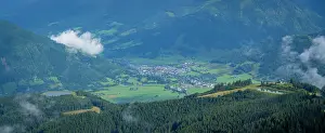 Meadows Prints: Stunning view from Schmittenhohebahn top station overlooking Kaprun and surrounding landscape on a sunny day in Austria