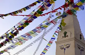 Religious Icon Prints: Stupa and prayer flags in the Whochen Thokjay Choyaling Monastery, Swayambhu, Nepal, Asia