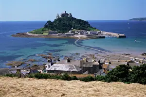 Marazion Prints: Submerged causeway at high tide, seen over rooftops of Marazion, St. Michaels Mount