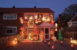Festivity Prints: Suburban house with Christmas lights and decorations, Surrey, England, United Kingdom
