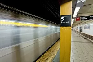 Subway station and train in motion, Manhattan, New York City, New York
