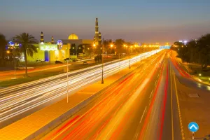 Tail Light Prints: Sultan Qaboos Grand Mosque and traffic on Sultan Qaboos Street at sunset, Muscat