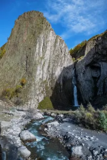 Fresh Prints: Sultan waterfall flows from rocky cliffs in Kabardino-Balkaria near Mount Elbrus