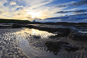 Bamburgh Prints: Summer sunset over Bamburgh beach lighthouse, Bamburgh, Northumberland, England