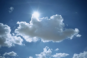 Sun emerging from behind cloud