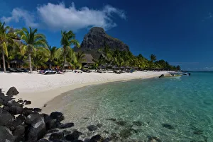 Images Dated 6th September 2007: Sun loungers on the beach and Mont Brabant (Le Morne Brabant), UNESCO World Heritage Site