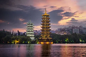 Guilin Prints: Sun and Moon pagodas at sunset in Guilin, Guilin, Guangxi, China, Asia