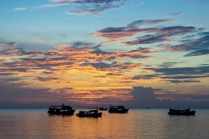 Typically Thai Prints: Sun sets over scuba diving boats in Koh Tao, Thailand, Southeast Asia, Asia