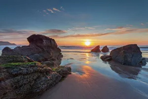 Glowing Prints: Sun setting over Sango Bay beach in mid-summer, Durness, Highlands, Scotland, United