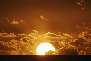 Sunsets Prints: Sun setting over the sea with light clouds, Fiji, South Pacific, Pacific