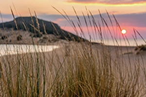 Midday Prints: Sun setting down at the sea on a wild natural beach, Elafonisos Island, Greece