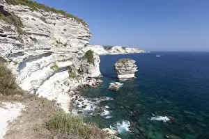 White Cliffs Prints: Sun shines on the white limestone cliffs framed by the turquoise sea, Bonifacio, Corsica