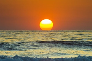 Nicoya Peninsula Prints: Sun touching horizon at sunset