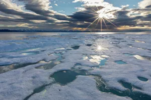 Nunavut Prints: Sunburst over fast ice in Lancaster Sound