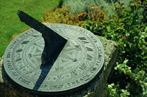 Time Collection: Sundial on plate of slate inscribed Noiseless falls the foot of time that only treads on flowers