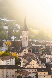 Old Towns Prints: Sunlight illuminates the old town of Chur, Canton Graubunden, Switzerland, Europe