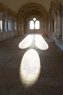 Traditionally Hungarian Prints: Sunlight pouring through arched windows