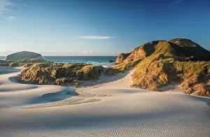 Dunes Prints: Sunlit Coastal Sand Dunes and Rugged Hills at Wharariki Beach Near Cape Farewell