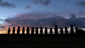 Silhouettes Prints: Sunrise at ahu tongariki with moai statues on easter island in chile