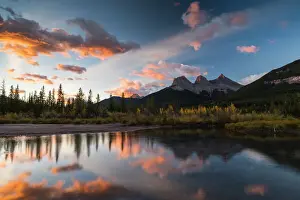 Fall Prints: Sunrise in autumn at Three Sisters Peaks near Banff National Park, Canmore, Alberta