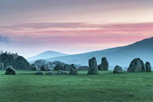 Sunrise over Castlerigg and St. John's in the Vale near Keswick, Lake District National Park, UNESCO World Heritage Site, Cumbria, England, United Kingdom, Europe