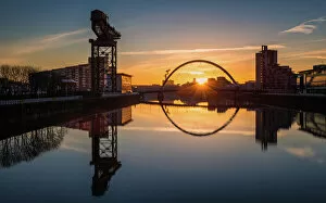 Silhouetted Gallery: Sunrise at the Clyde Arc (Squinty Bridge), Pacific Quay, Glasgow, Scotland, United Kingdom