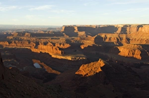 Arid Landscape Prints: Sunrise at Dead Horse Point looking out at the Colorado