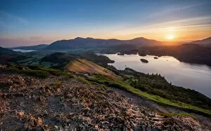 Glowing Gallery: Sunrise over Derwentwater from the summit of Catbells near Keswick, Lake District National Park