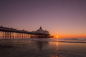 Glowing Prints: Sunrise at Eastbourne Pier, Eastbourne, East Sussex, England, United Kingdom, Europe