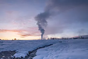 Geyser Prints: Sunrise eruption of Old Faithful geyser with stream, Yellowstone National Park