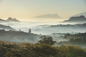 Malawi Prints: Sunrise and fog over the mountains surrounding Blantyre, Malawi, Africa